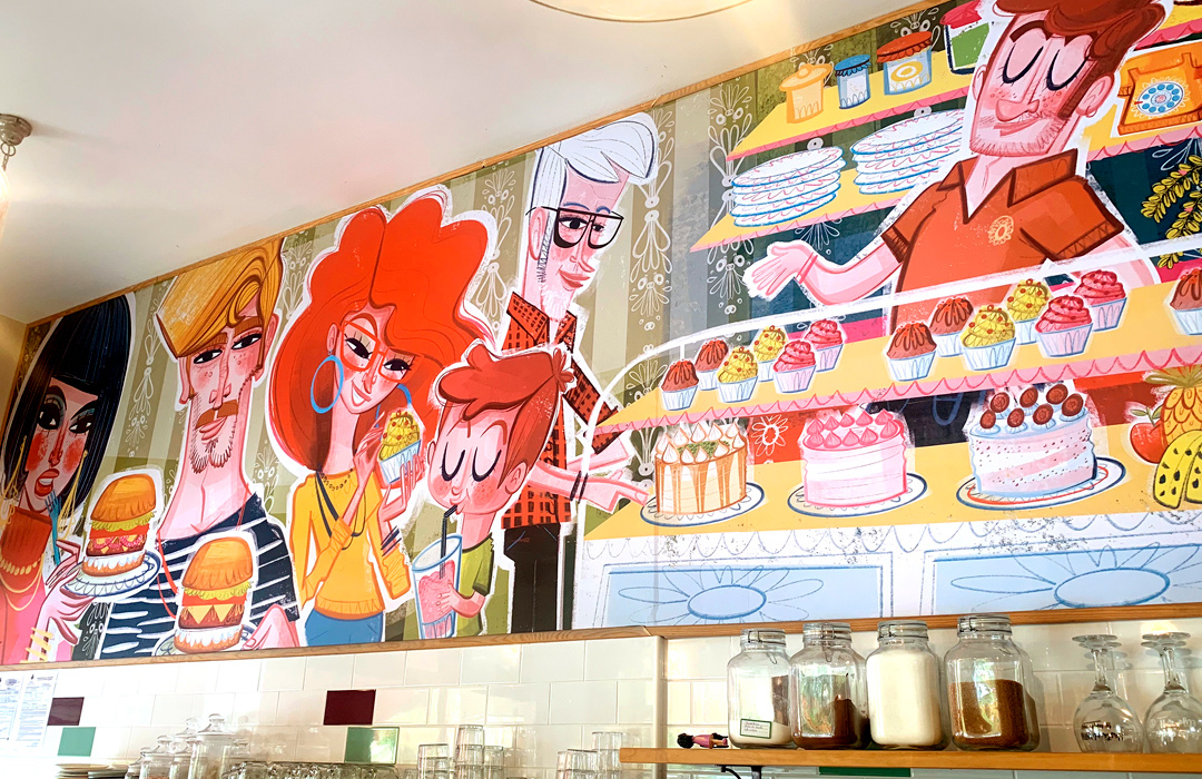 Mural en cafetería caprichos